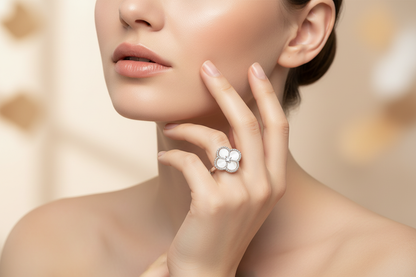 Woman wearing clover ring touching neck - lifestyle shot