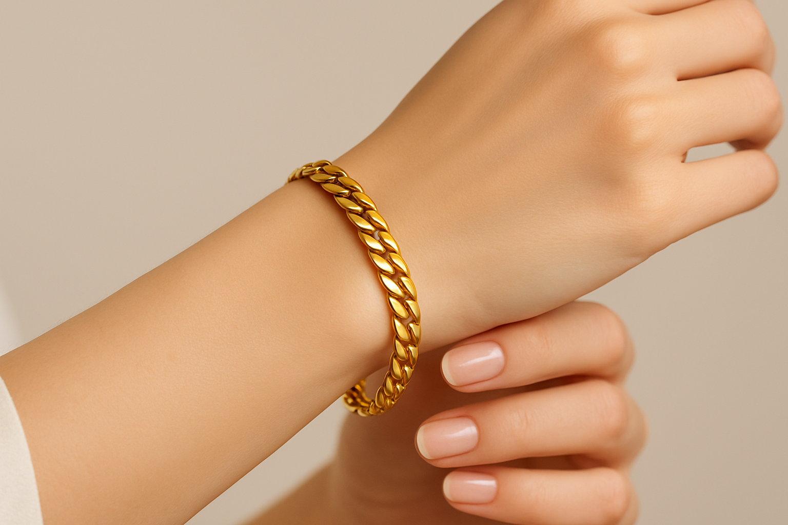 Woman wearing gold chain bracelet